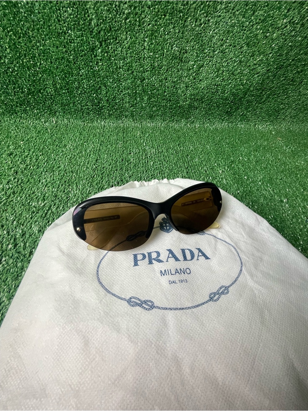 Prada Two-Tone Cat Eye Sunglasses in Black and Yellow - Picture 14 of 15